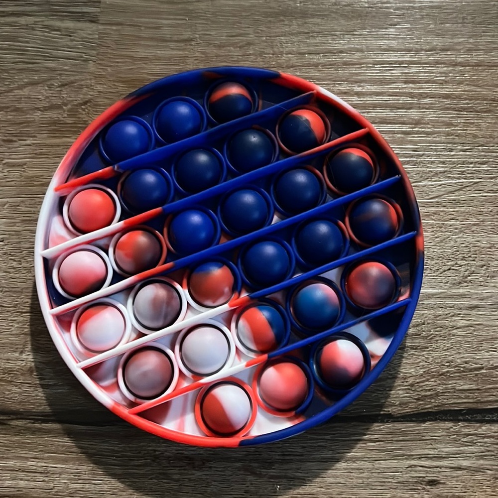 Red blue and white tye dye color popet